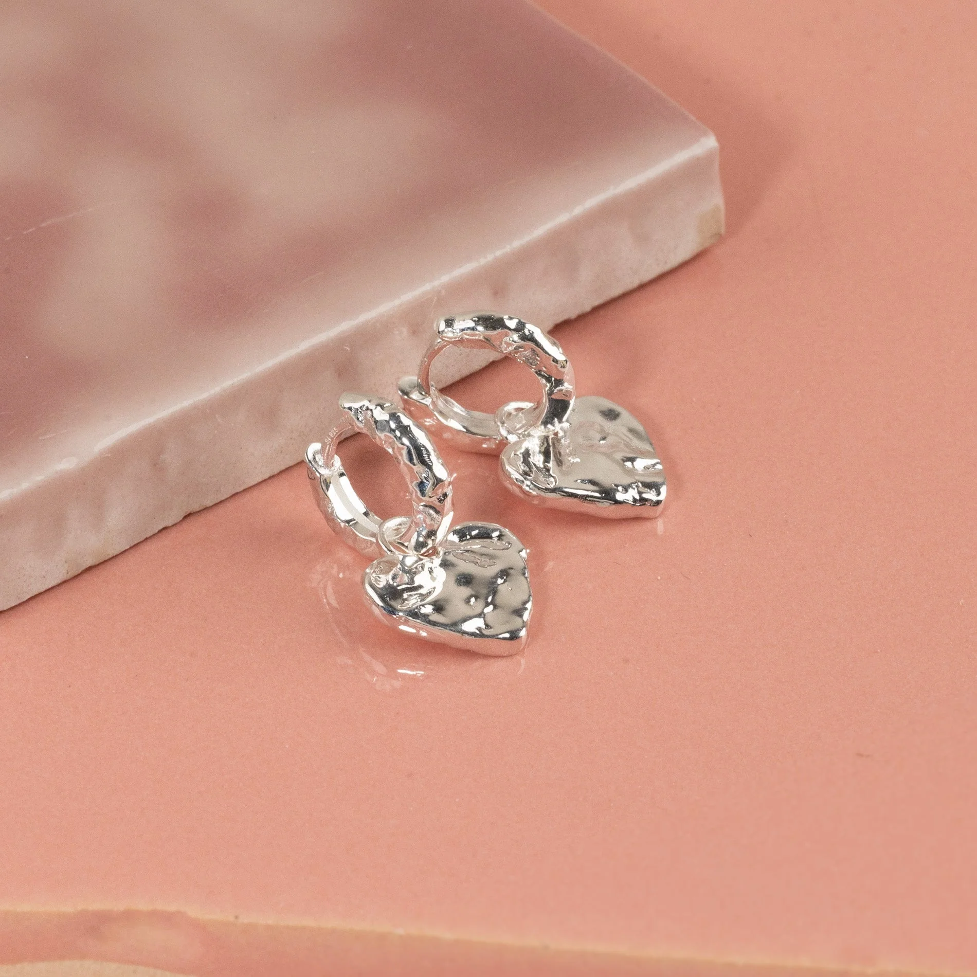 AMABEL SILVER HUGGIE EARRING - Image 3