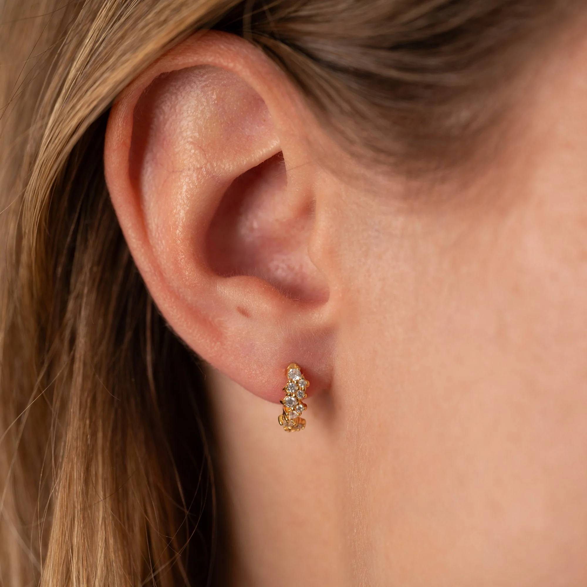CLAIR CRYSTAL GOLDEN MINI HUGGIE EARRING - Image 2