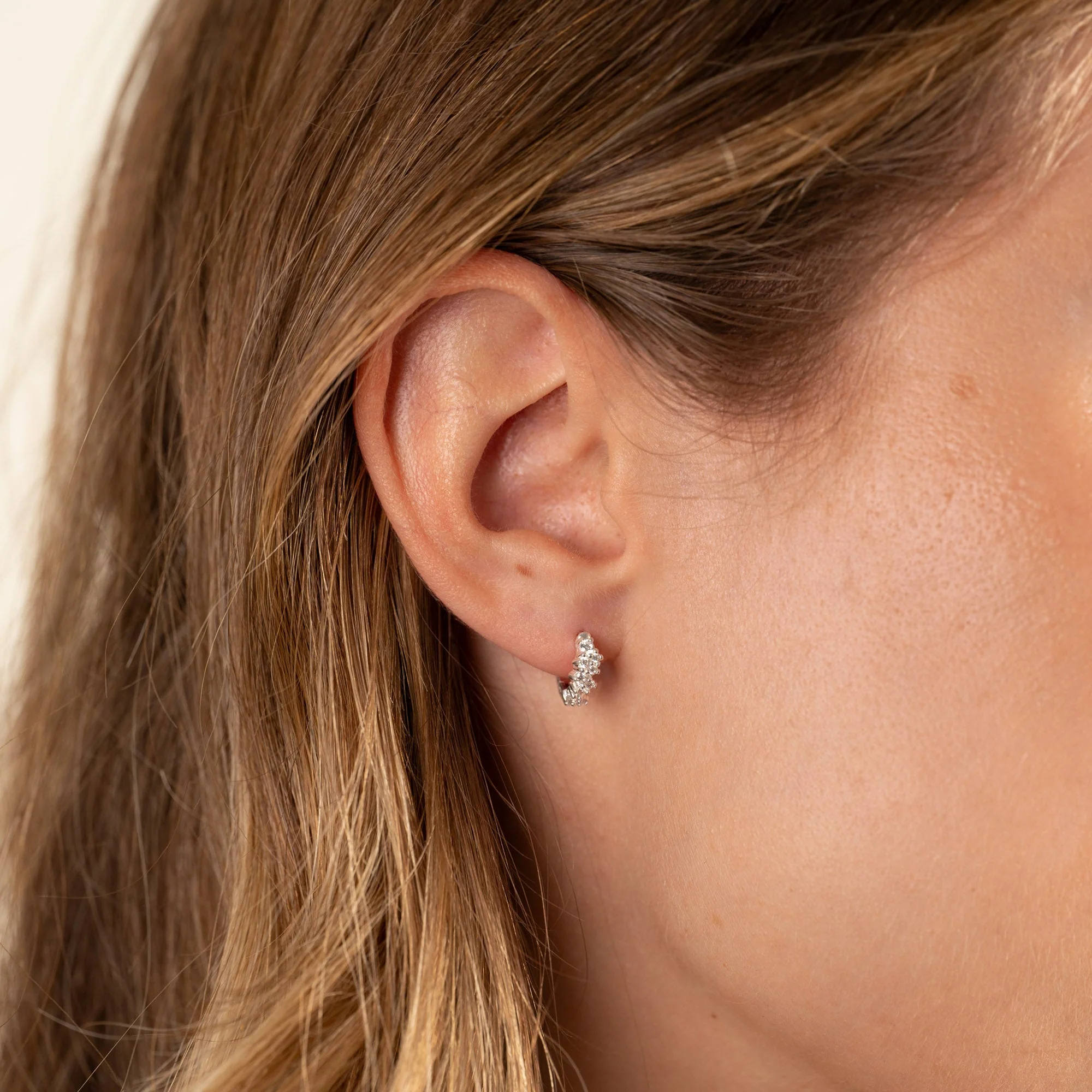 CLAIR CRYSTAL SILVER MINI HUGGIE EARRING - Image 2