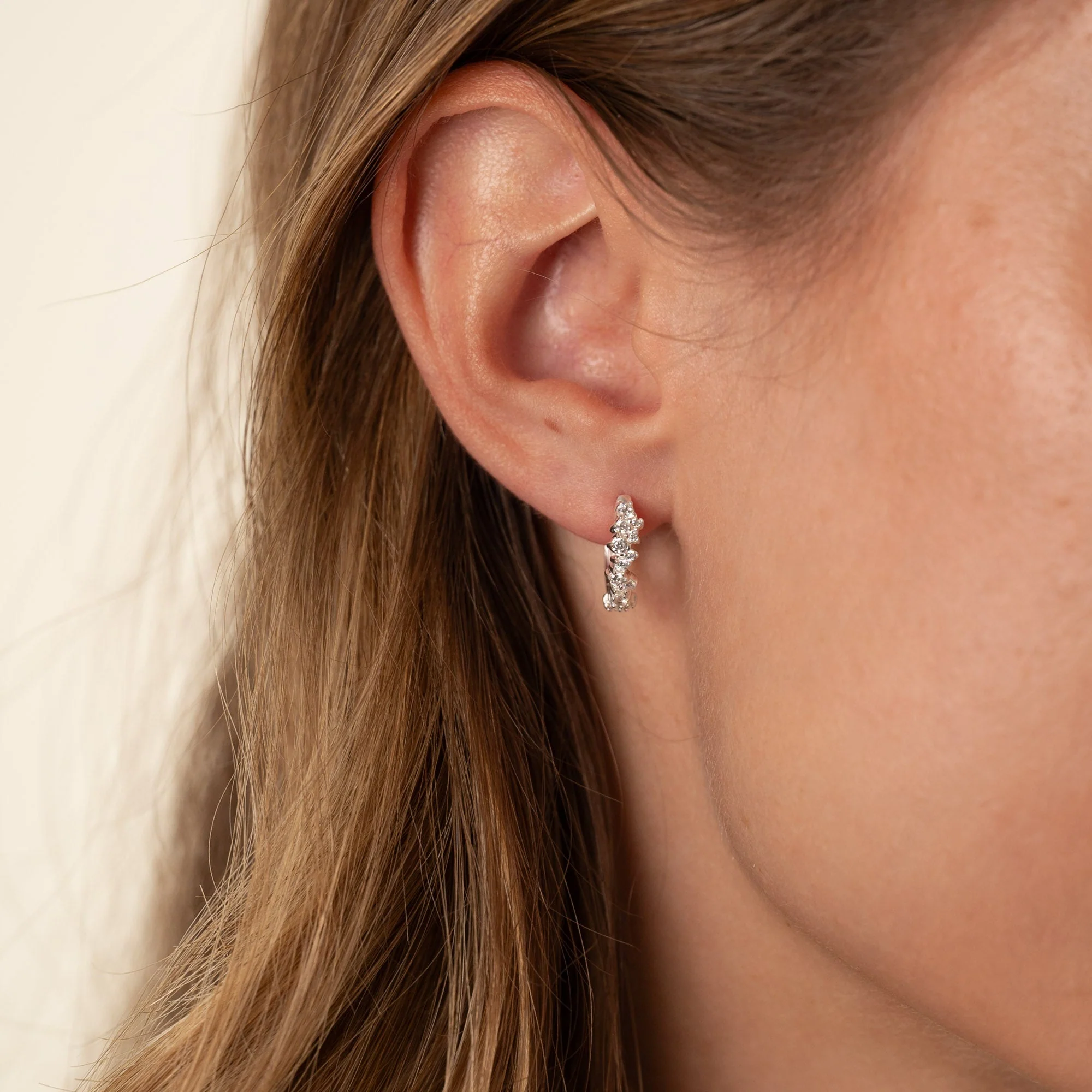 CLAIR CRYSTAL SILVER SMALL HUGGIE EARRING - Image 2