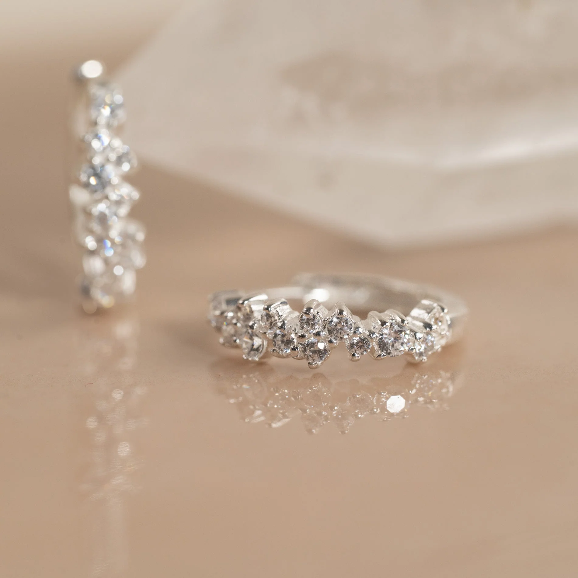 CLAIR CRYSTAL SILVER SMALL HUGGIE EARRING - Image 3