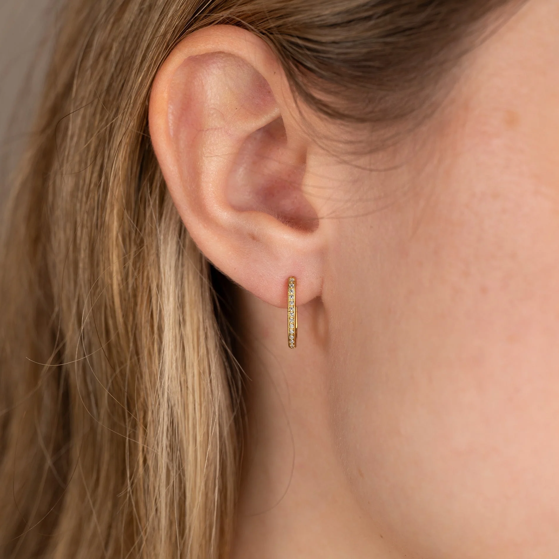 DANIA CRYSTAL GOLDEN HUGGIE EARRING - Image 2