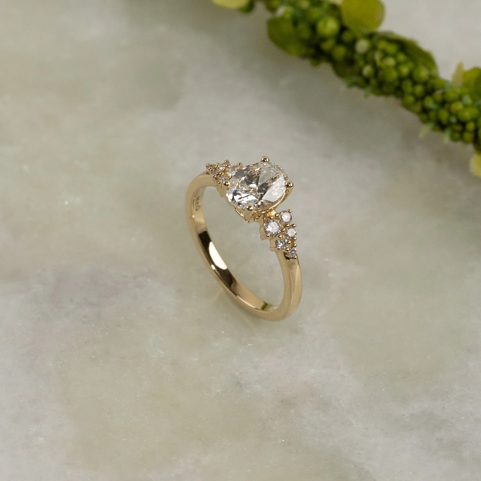 DELICATE CLUSTER OVAL-CUT DIAMOND RING - Image 4
