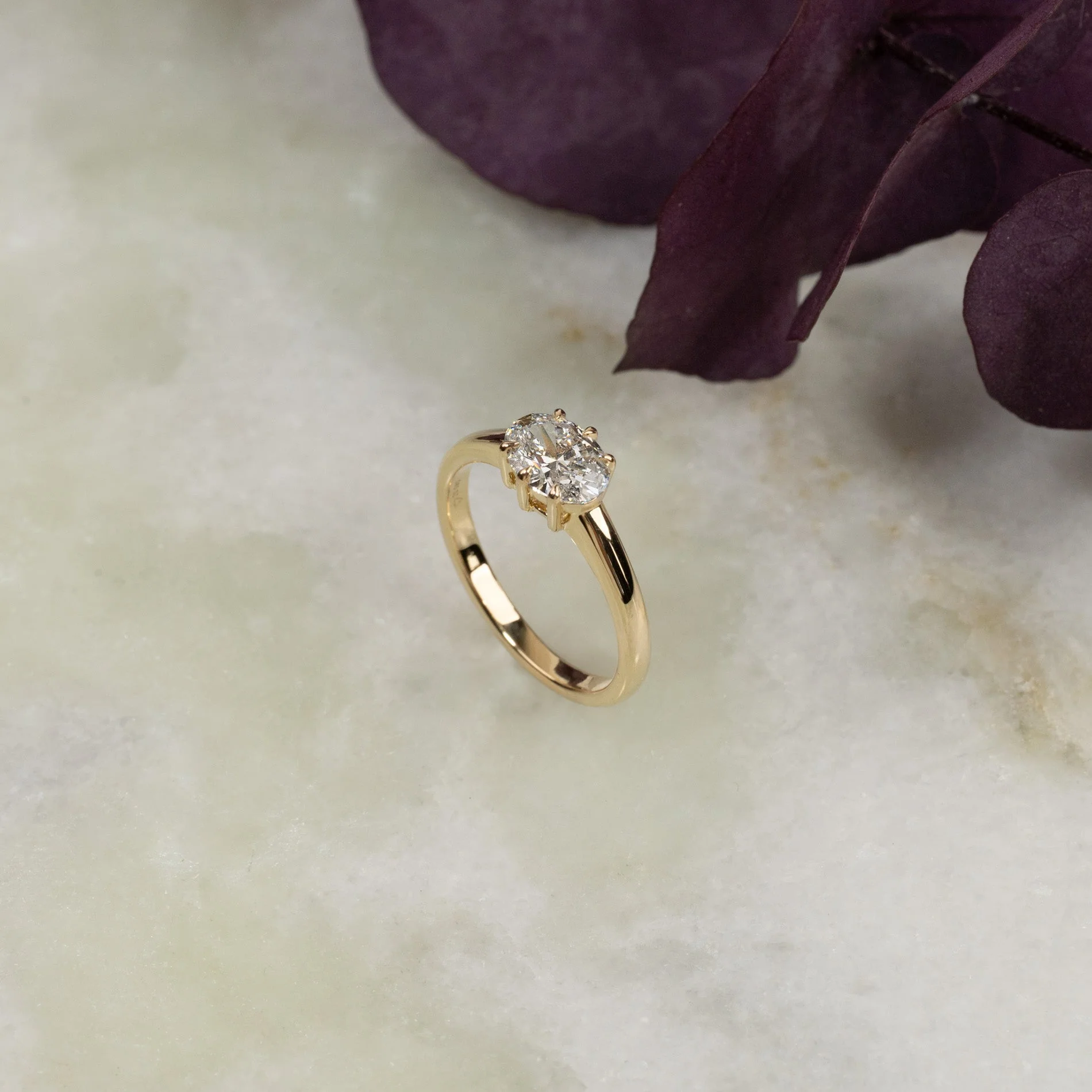 EAST TO WEST OVAL-CUT SOLITAIRE DIAMOND RING - Image 2