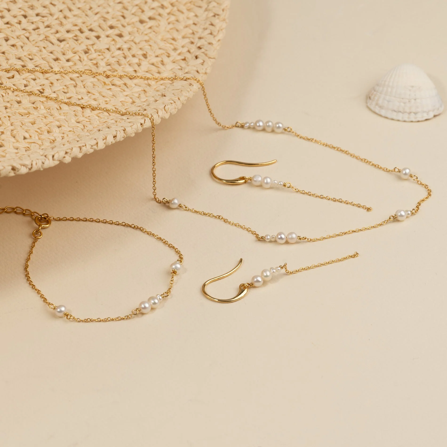 EVIE PEARL GOLDEN DROP EARRING - Image 9