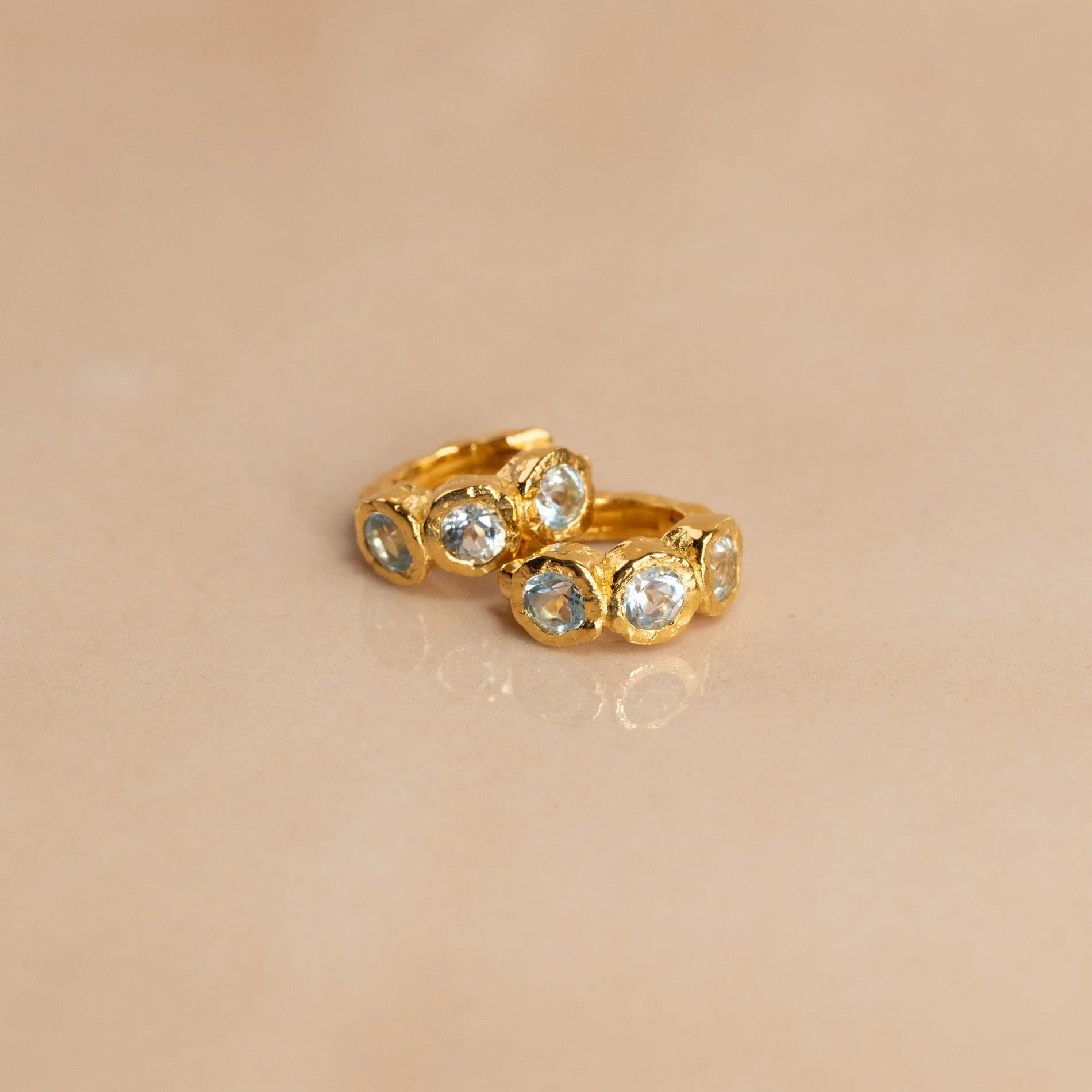 SELENE BLUE TOPAZ GOLDEN HUGGIE EARRING - Image 3
