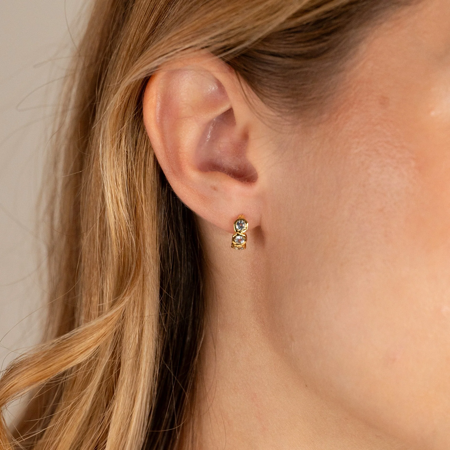 SELENE BLUE TOPAZ GOLDEN HUGGIE EARRING - Image 4