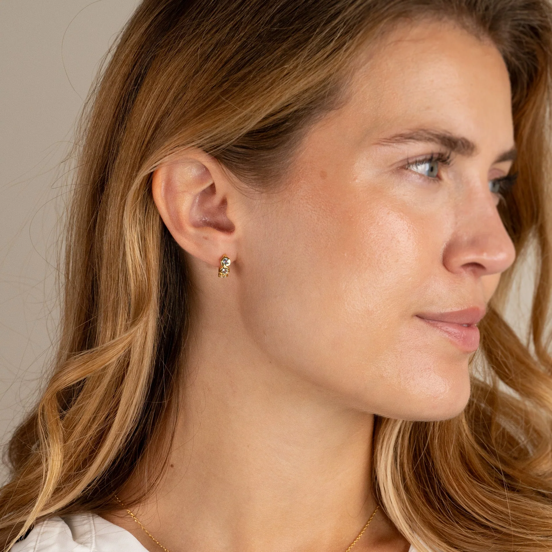 SELENE BLUE TOPAZ GOLDEN HUGGIE EARRING - Image 6
