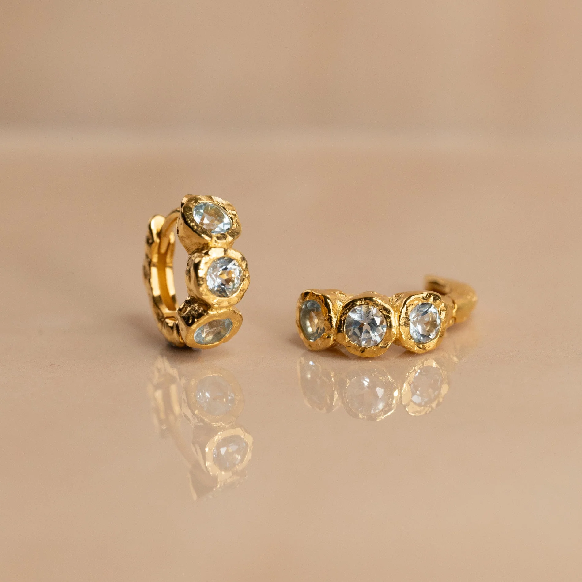 SELENE BLUE TOPAZ GOLDEN HUGGIE EARRING - Image 7