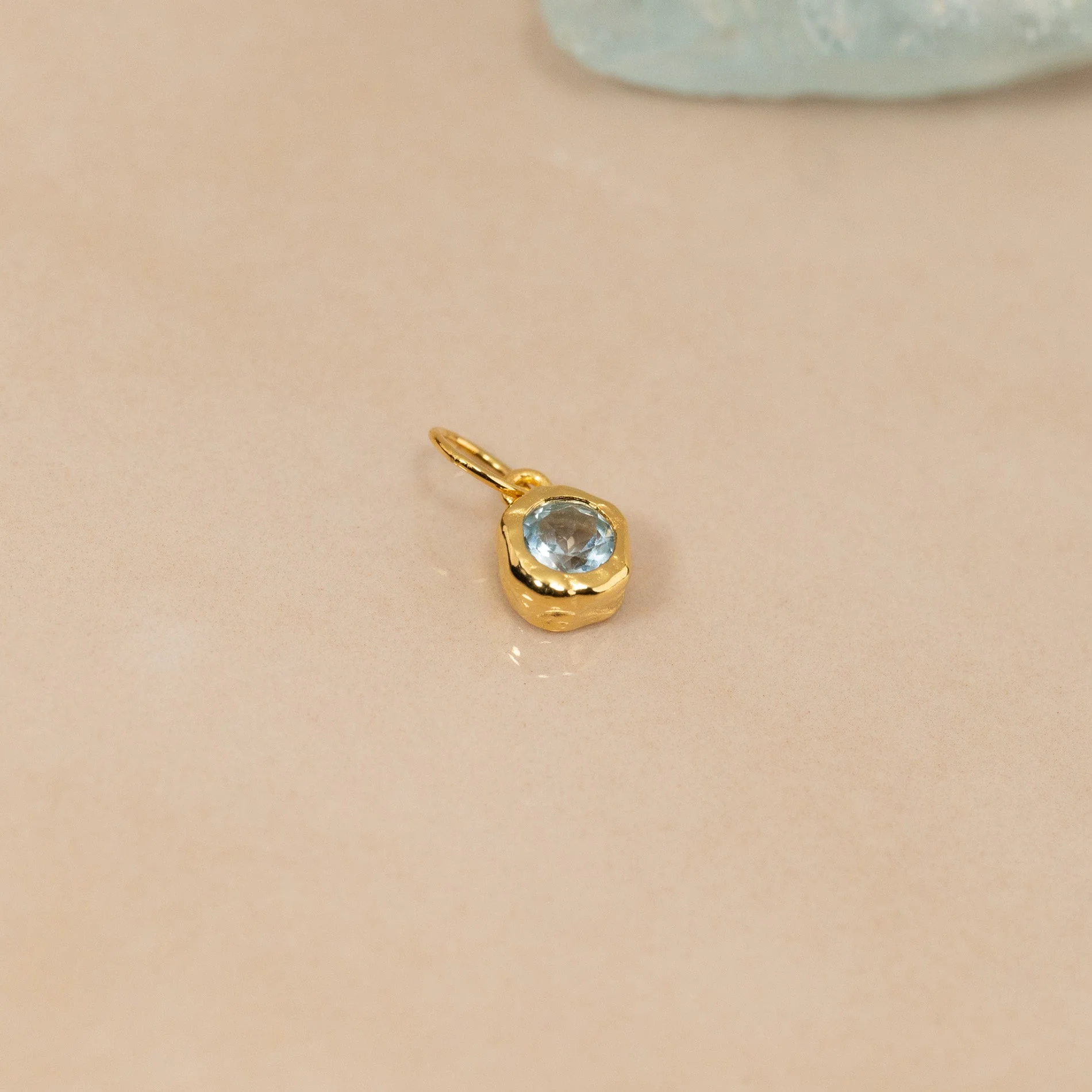 SELENE BLUE TOPAZ GOLDEN PENDANT