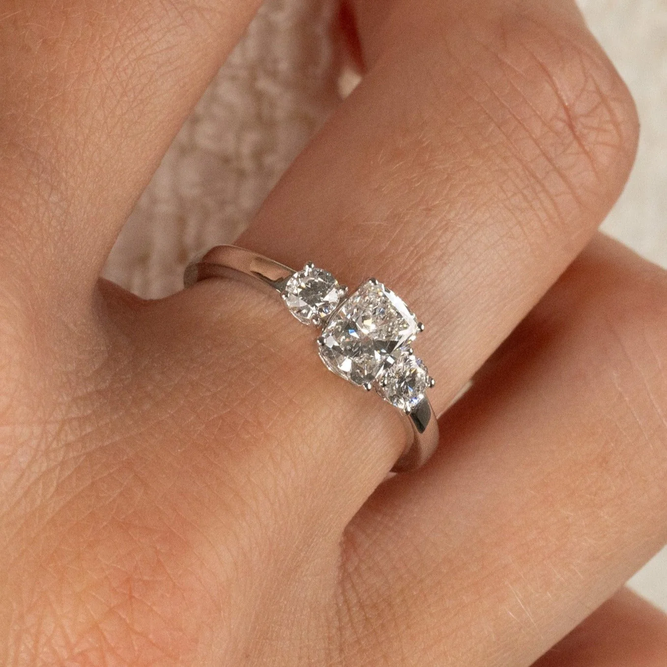 THREE-STONE RECTANGULAR CUSHION-CUT DIAMOND RING - Image 2